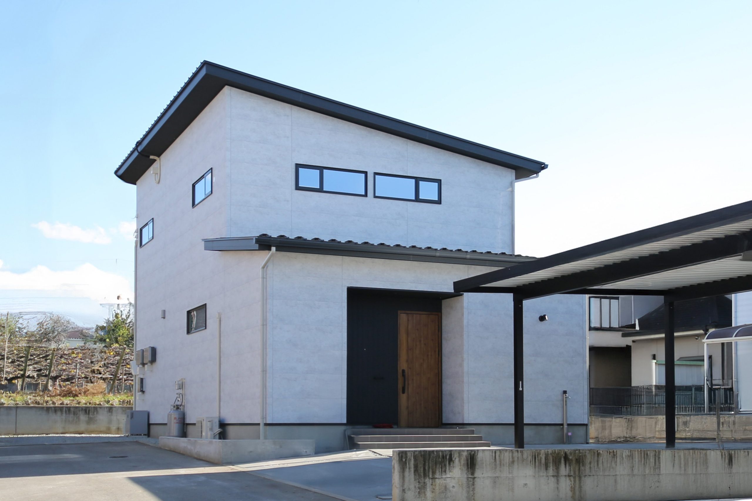 都会的なライトグレー×黒の美邸